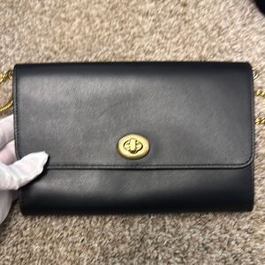 Coach Elegant Black Leather Bag with Gold Accents